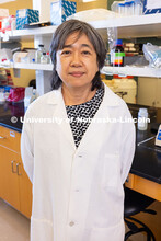 Dr. Etsuko Moriyama, Professor of Biological Sciences poses for a photo in her virology lab. Three u