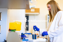Avery Marquis, Senior Spanish, Biological Sciences and Pre-Veterinary Medicine major, works with tes