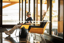 Zach Harding, a Junior Architectural Studies major, sits in HDR Pavilion space in Architecture Hall 