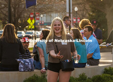 Tori Riese, an incoming Husker, tosses a bean bag at the tailgate for incoming freshman outside the 