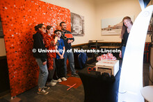 Admitted students have fun at the photo booth at the Nebraska Union on Admitted Students Day. Admitt