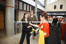 Grace Thompson hands out corn necklaces to families on Admitted Student Day

Admitted Student Day is
