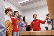 Justin Kleen, senior engineering student (right) shows students a lab offered in Kiewit Hall on Admi