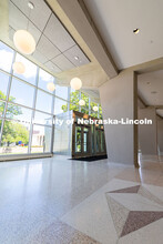 The newly renovated lobby of Kimball Recital Hall kept the large cement pillars and terrazzo floors 