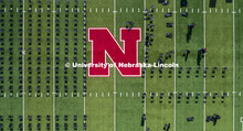 Chairs are set up on Tom Osborne Field in Memorial Stadium for Saturday’s commencement. May 6, 202