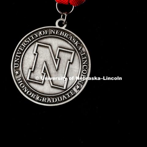 University of Nebraska-Lincoln honor graduate medallion. March 31, 2017. Photo by Craig Chandler / University Communication.