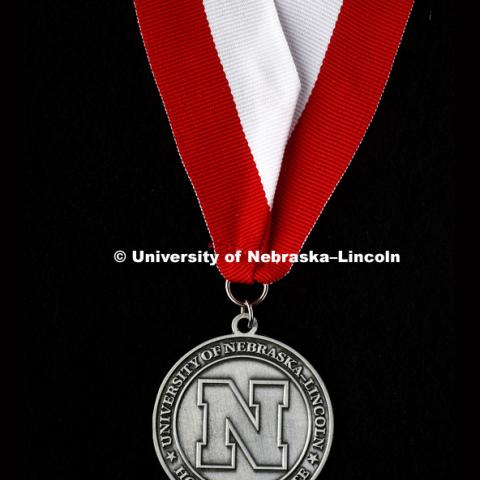 University of Nebraska-Lincoln honor graduate medallion. March 31, 2017. Photo by Craig Chandler / University Communication.