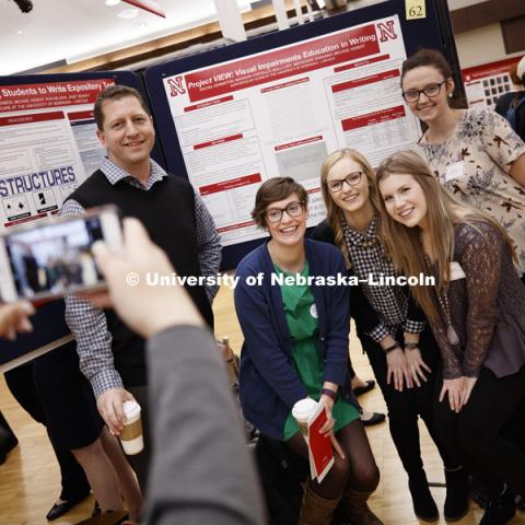 Michael Hebert's research students pose for a team photo at the beginning of the Research Fair. The first day of the Spring Research Fair features undergraduate student research. April 4, 2017. Photo by Craig Chandler / University Communication.