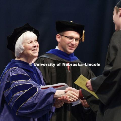 College of Education and Human Sciences Dean Marjorie Kostelnik hands out diplomas Saturday morning in Lincoln's Pinnacle Bank Arena. 2452 degrees were awarded Saturday morning. May 6, 2017. Photo by Craig Chandler / University Communication.