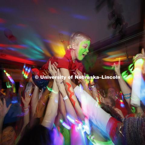 Brady Luke, a 10-year-old from Omaha and one of the Children Hospital's Miracle Kid, crowd surfs across the ballroom floor. 1274 Nebraska students signed up to be part of the Huskerthon Dance Marathon for Children's Hospital in Omaha. February 17, 2019.
