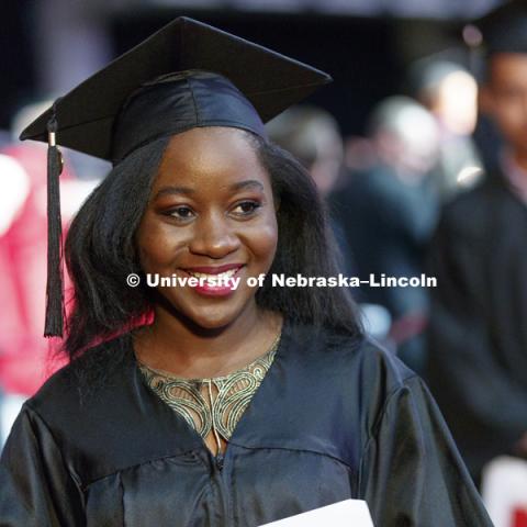 Jemimah Ndugwa celebrates her engineering degree. Undergraduate Commencement at Pinnacle Bank Arena. May 5, 2018. Photo by Craig Chandler / University Communication.