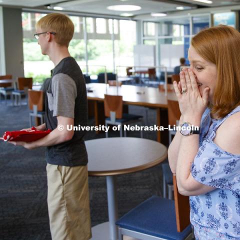 Sam mom, Elisia Flaherty, reacts as Sam is interviewed by the Grand Island Independent after receiving a full ride scholarship offer the university presented by Executive Vice Chancellor Donde Plowman. Sam is a high school junior from Grand Island and