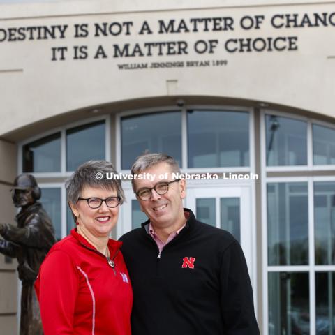 Chancellor Ronnie Green and Jane Green, his wife, in front of north stadium.  June 22, 2018. Photo by Craig Chandler / University Communication.