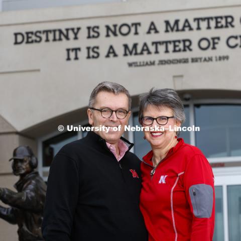 Chancellor Ronnie Green and Jane Green, his wife, in front of north stadium.  June 22, 2018. Photo by Craig Chandler / University Communication.