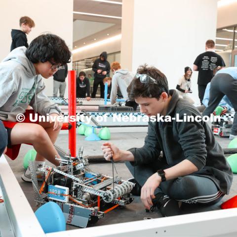 Brownell Talbot students testing their robot before an Autonomous round. 2024 VEX Robotics Outreach Tournament hosted in Kiewit Hall. February 10, 2024. Photo by Taryn Hamill for University Communication and Marketing.