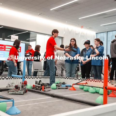 UNL student, Mac Depriest setting up before gameplay. 2024 VEX Robotics Outreach Tournament hosted in Kiewit Hall. February 10, 2024. Photo by Taryn Hamill for University Communication and Marketing.