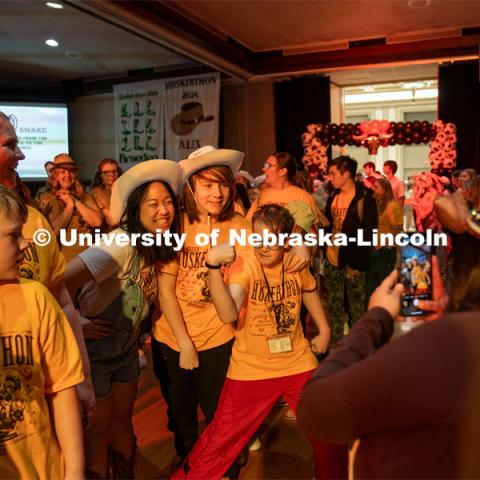 University of Nebraska-Lincoln student, Jennifer Castle, poses for a photo with her miracle kids at Dance Marathon. University of Nebraska–Lincoln students raised $83,702.24 during the annual HuskerThon. Also known as Dance Marathon, the event is part of a nationwide fundraiser supporting Children’s Miracle Network Hospitals. The annual event, which launched in 2006, is the largest student philanthropic event on campus. The mission of the event encourages participants to, “dance for those who can’t.” All funds collected by the Huskers benefit the Children’s Hospital and Medical Center in Omaha. March 2, 2024. Photo by Kirk Rangel.