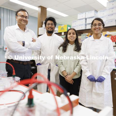 Shaonpius Mondal, Assistant Professor of Entomology, graduate students Mritunjoy Barman, Sofiya Arora and Nikhitha Gangavarapu. Shaonpius Mondal, Assistant Professor of Entomology, is doing research into mite- and aphid-borne viruses that are causing major concern for producers of wheat and small grains. March 13, 2024. Photo by Craig Chandler / University Communication and Marketing.